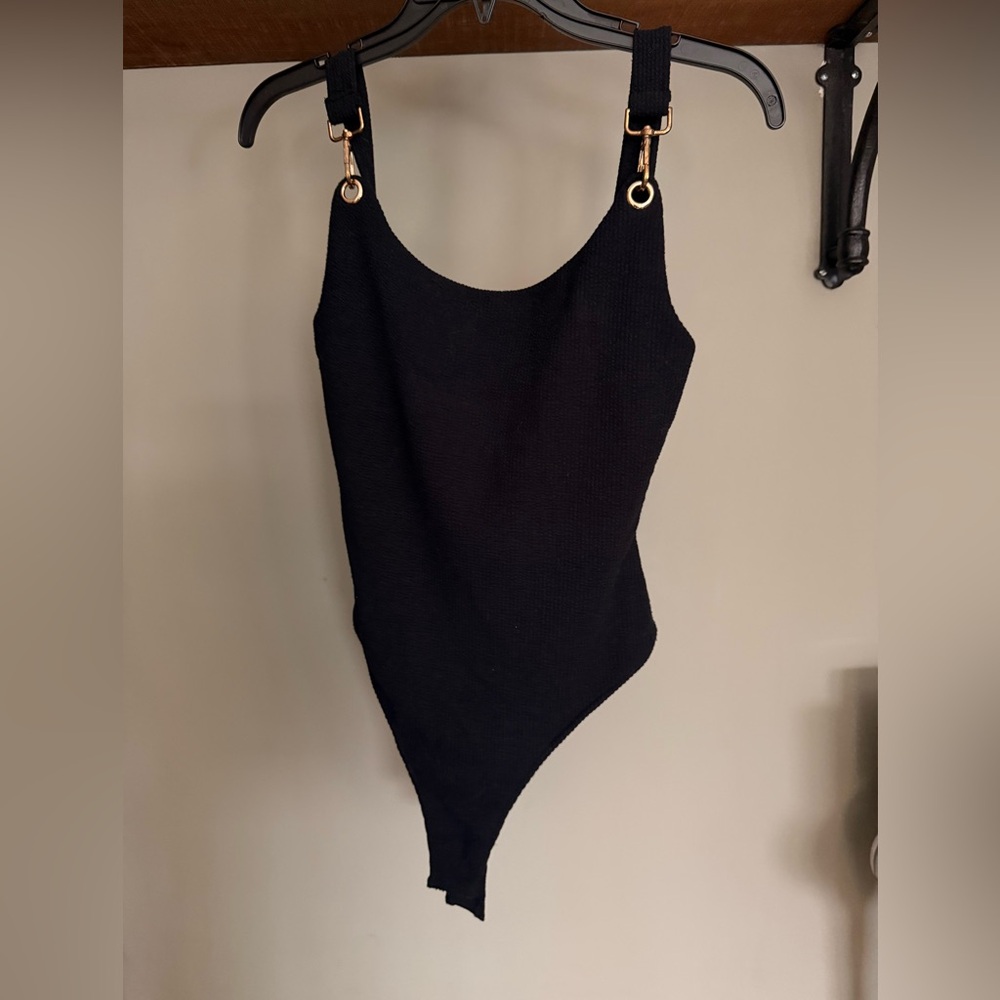 Elegant Black Women's Bodysuit with Gold Accents